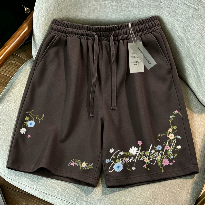 ESSENTIALS GOLD trendy summer breathable shorts with elastic waistband, casual deep fog embroidery floral straight tube