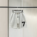 Trendy brand ESSENTIALS men's solid color looped five quarter shorts with drawstring and elastic waist, versatile street shorts